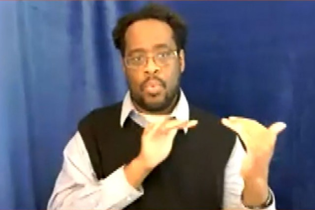 professor using sign language.