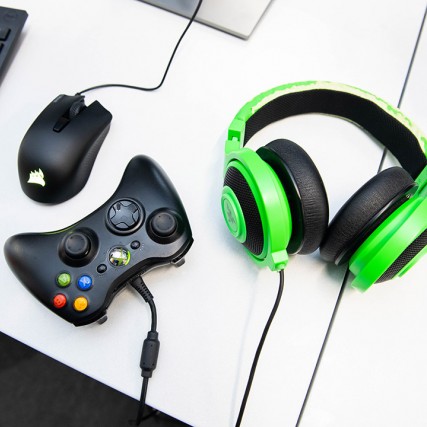 computer mouse, Xbox controller, and headphones.