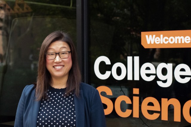 Dr. Lea Michel in front of the College of Science