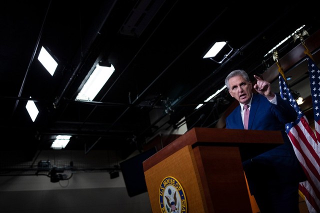 Representative Kevin McCarthy speaking at a podium.