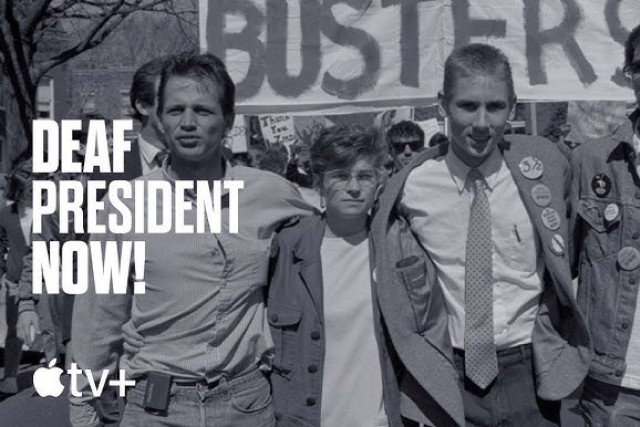 a black and white photo of student sin the 1960s with the words deaf president now on the left side