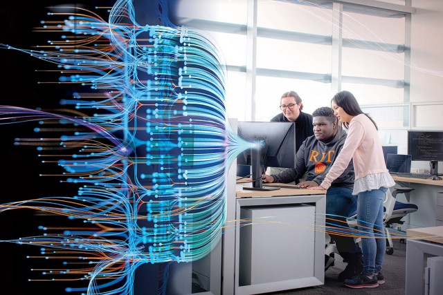 a multicolored spectrum of lines shows on the left side of a screen blending in to a photo of students working in a group of three in a computer lab.