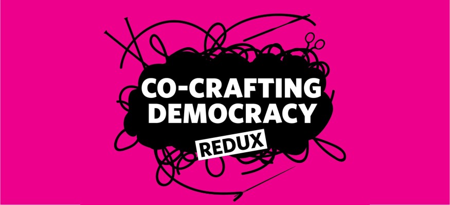 Pink background with black graphic and white text saying "Co-Crafting Democracy Redux"
