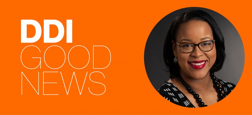 orange background with white text and headshot