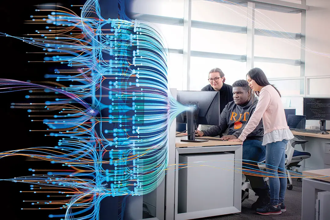 a multicolored spectrum of lines shows on the left side of a screen blending in to a photo of students working in a group of three in a computer lab.