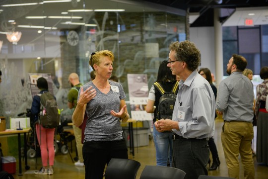 Photo by Grace Klinger: RIT Kate Gleason College of Engineering associate professor Dan Phillips, right.