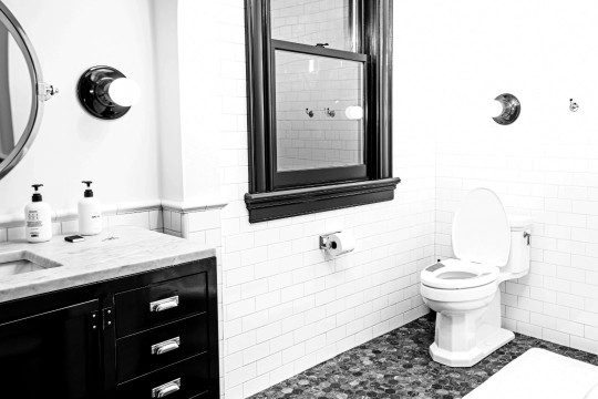 the casana smart seat is shown in a realistic modern bathroom