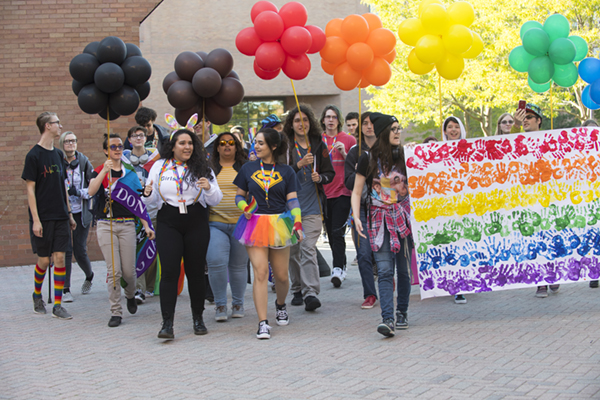 Students from Outspoken walking on campus