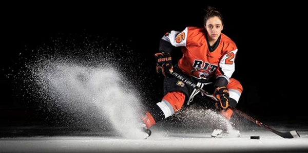 Girl playing ice hockey
