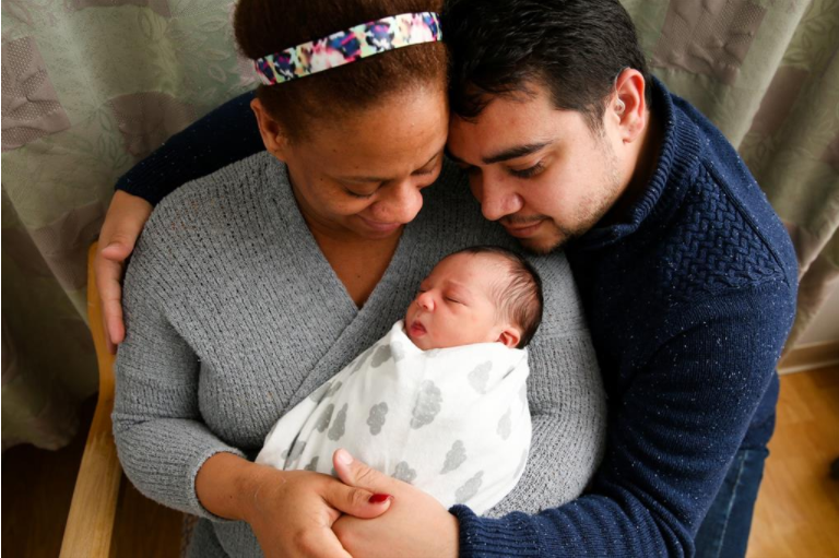 Michael Berrios and Lorenny Mota Morla with their son Silas Michael