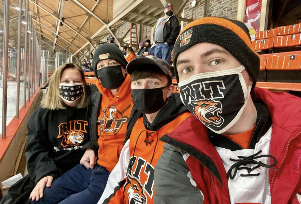 Group of people wearing RIT masks