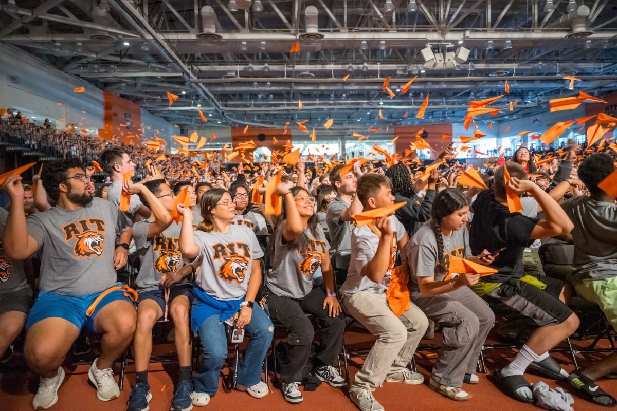 Students throwing Paper Planes.
