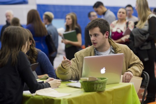 People working at tables