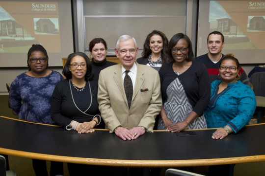 People posing at event