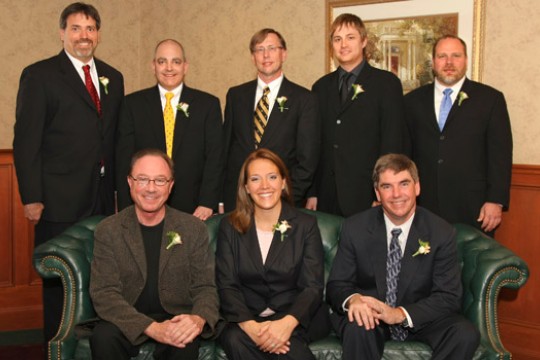 People dressed up for event