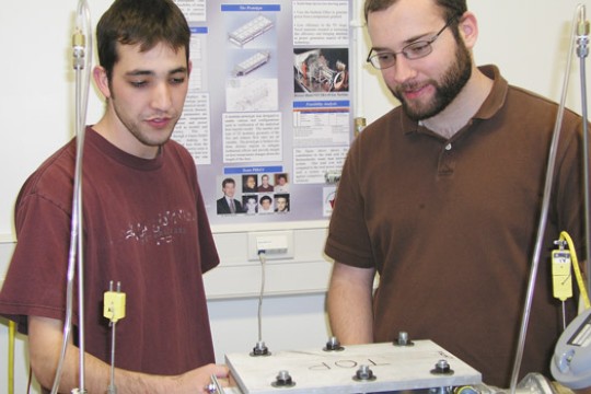 Students building machine