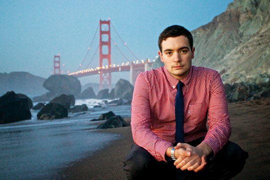 Person posing in front of Golden Gate Bridge
