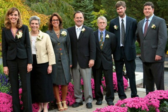 People dressed up posing in a line