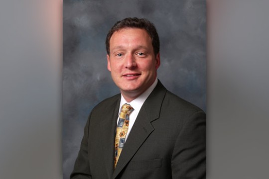 Professor posing for camera