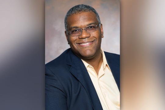 Professor posing for camera