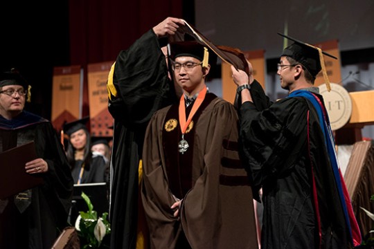 Graduate Students being awarded for efforts