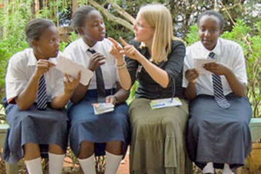 Person teaching kids