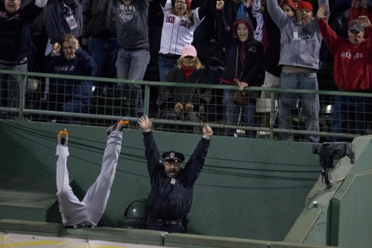 People raising there hands at event