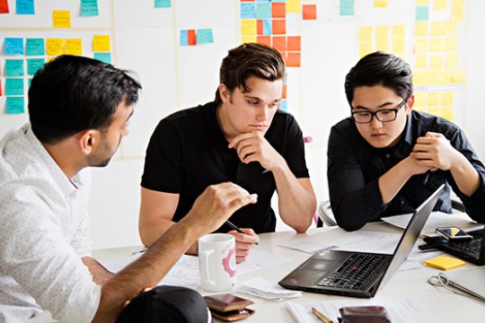 People working on project at table