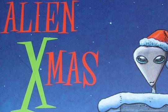 drawn graphic of alien wearing Santa hat in chimey with words: Alien Xmas.