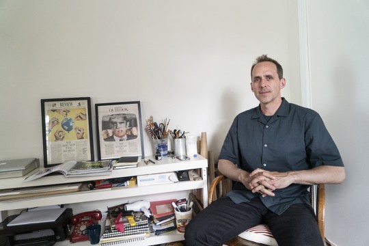 Doug Chayka poses in his home office in New Jersey. 