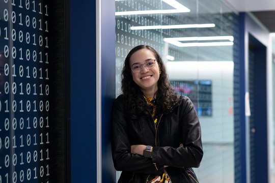 environmental portrait of student Joanna C. S. Santos.