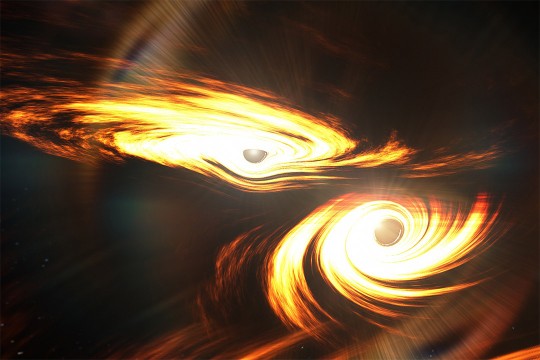 Artist’s impression of binary black holes about to collide.