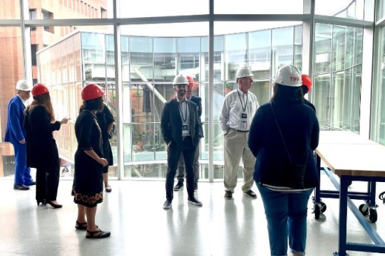 a group of particiapnts touring the new SHED