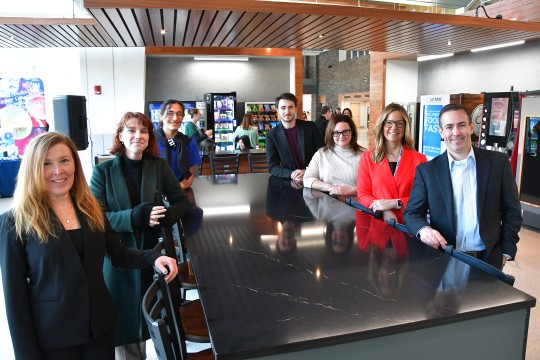 The RIT and Syracuse airport team at a grand opening event.