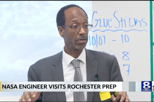 Clayton Turner speaks to a classroom of students.