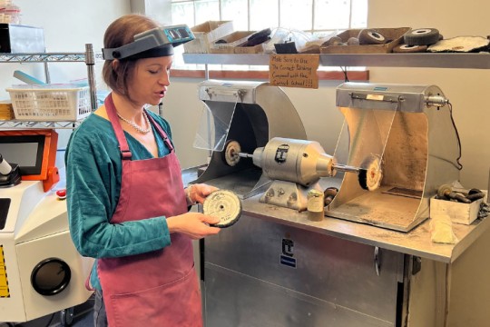 Stephanie Perrotti works at the bench of jeweler Vanscoy, Mauer & Bash Diamond. 