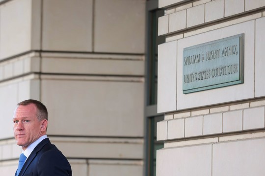 Man in suit outside William B. Bryant Annex, United States Courthouse