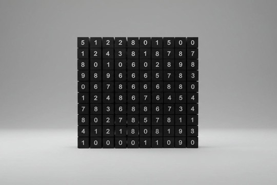 A large black square against a white and gray plain background. The black square is made of a bunch of smaller black squares, each with a number on it in white ink. The large square is 10 squares wide and 10 squares tall