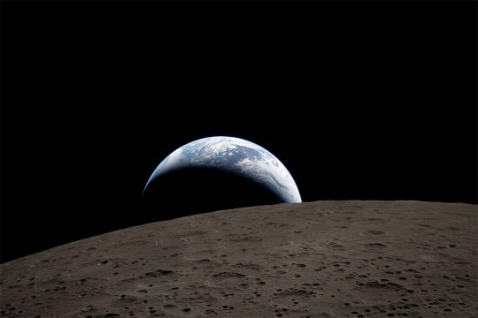 a vew of earth with the moon in the foreground