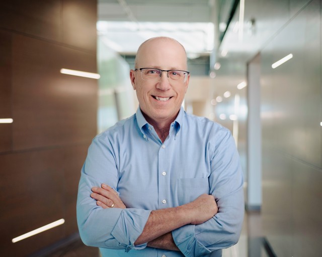a headshot of Jeffrey Carlson