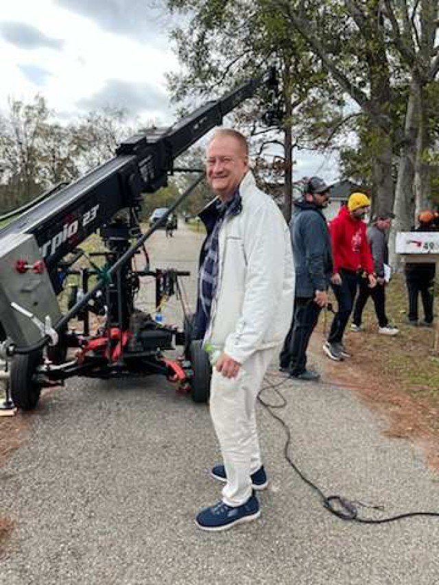 Bob preparing to shoot a scene of the police storming the killer’s house using their Scorpion Crane.