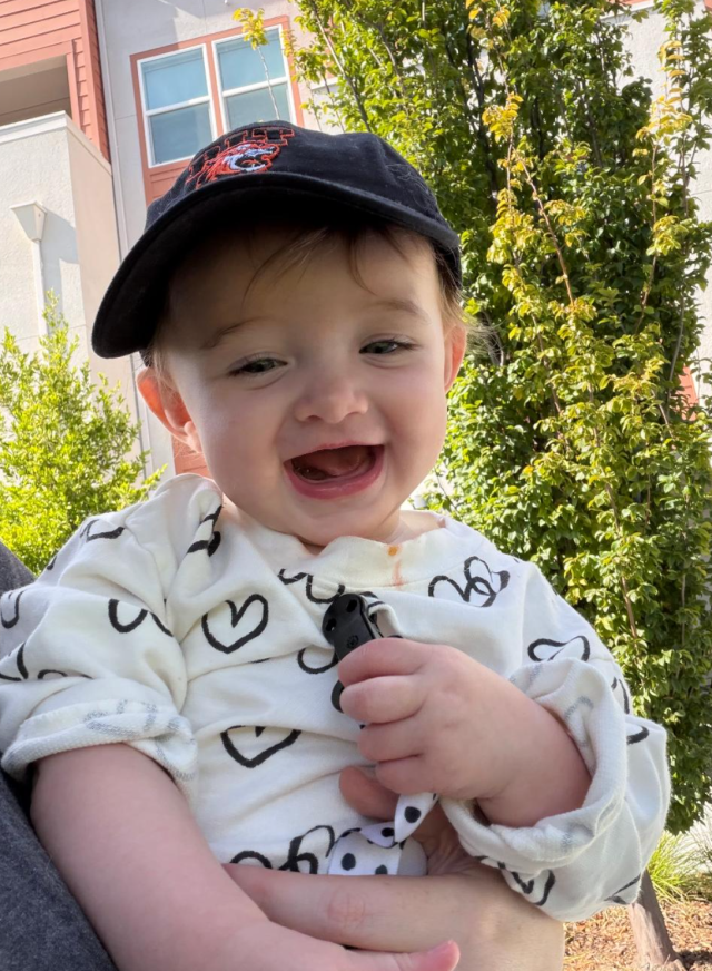 Violet sporting her RIT hat and repping her future school!