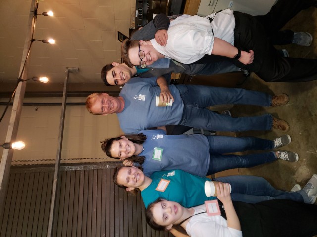 Greg Germain with 321 Coffee founders and employees