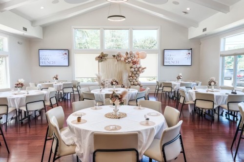 a dining area inside the Lobozzo Alumni House event venue