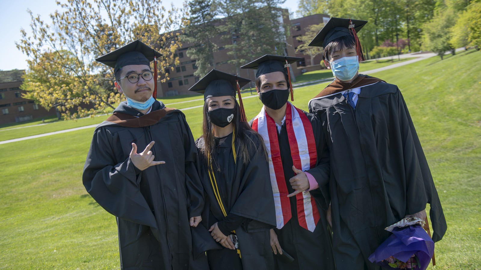 Four students pose for a photo.