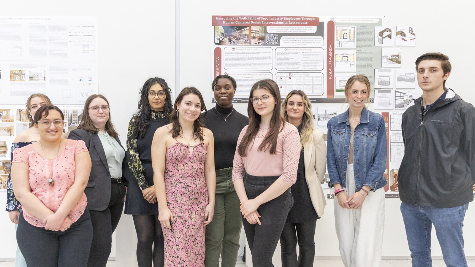 A group of interior design seniors pose for a group photo.