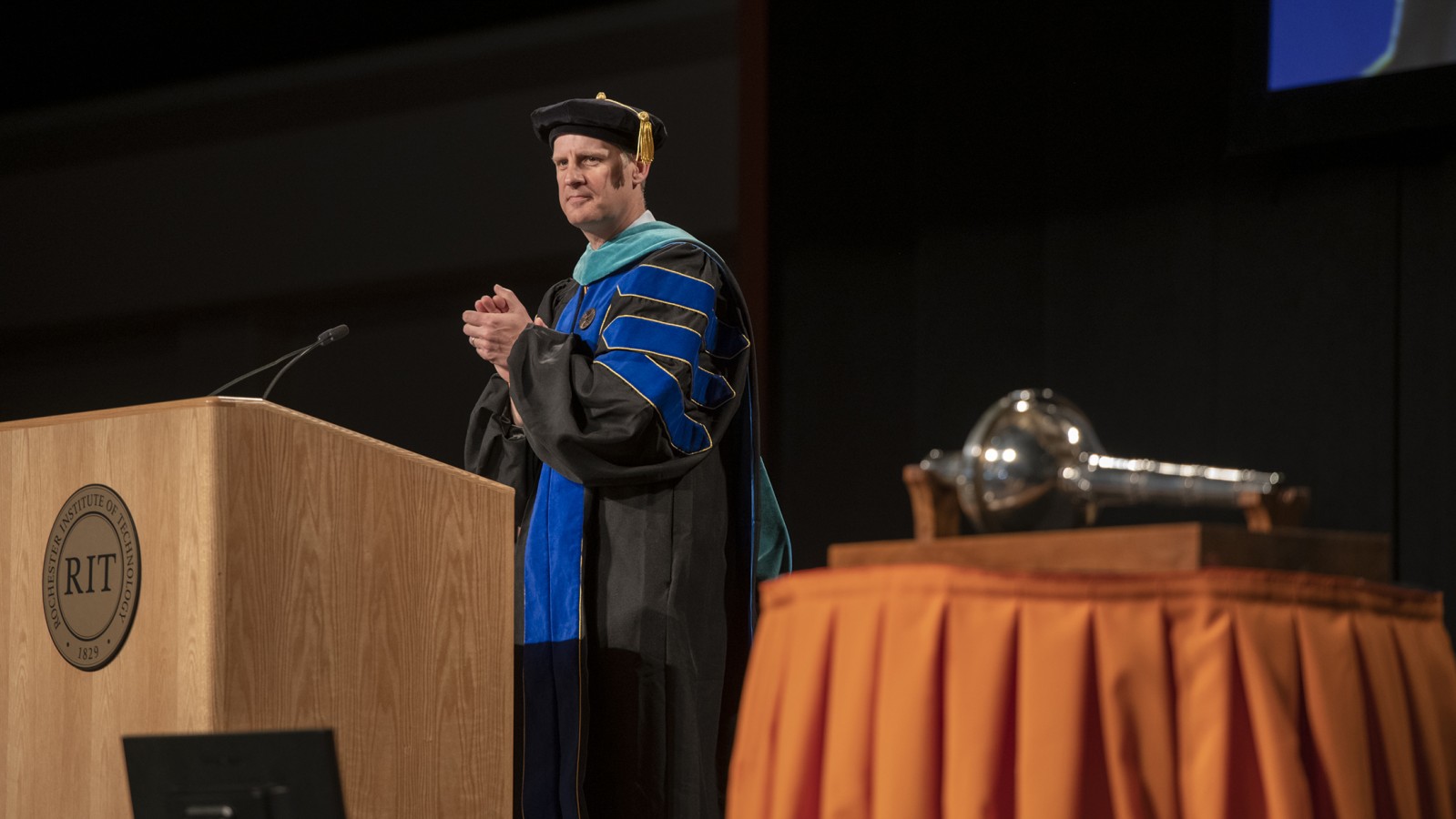 Dean Todd Jokl at the lectern.