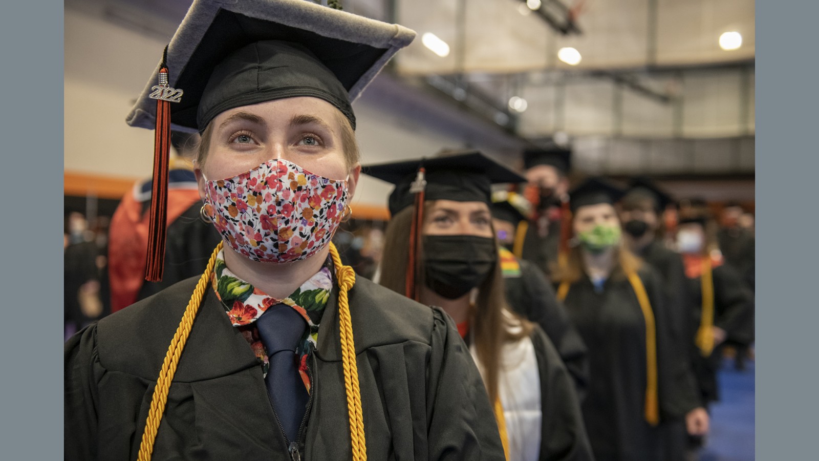 A graduate candidate looks on during the commencement ceremony.
