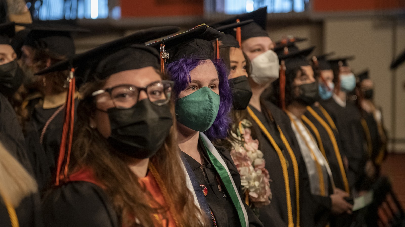 Students in the commencement ceremony crowd.