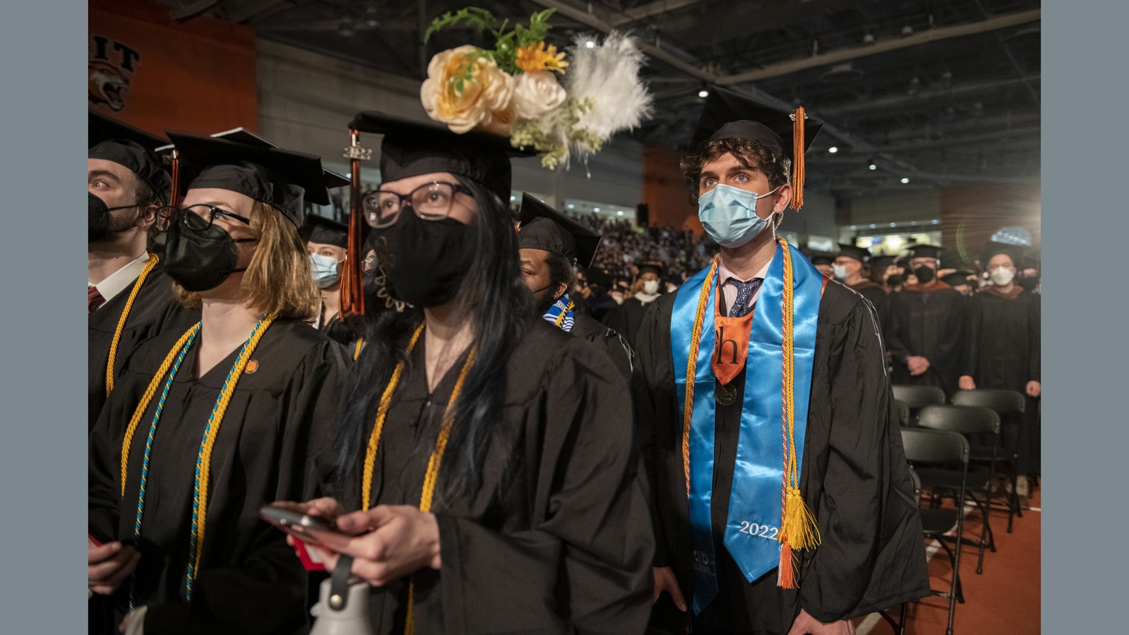 Students in the commencement ceremony crowd.